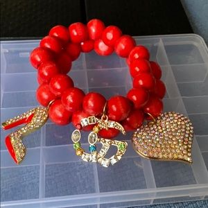 Beaded bracelet with charms
